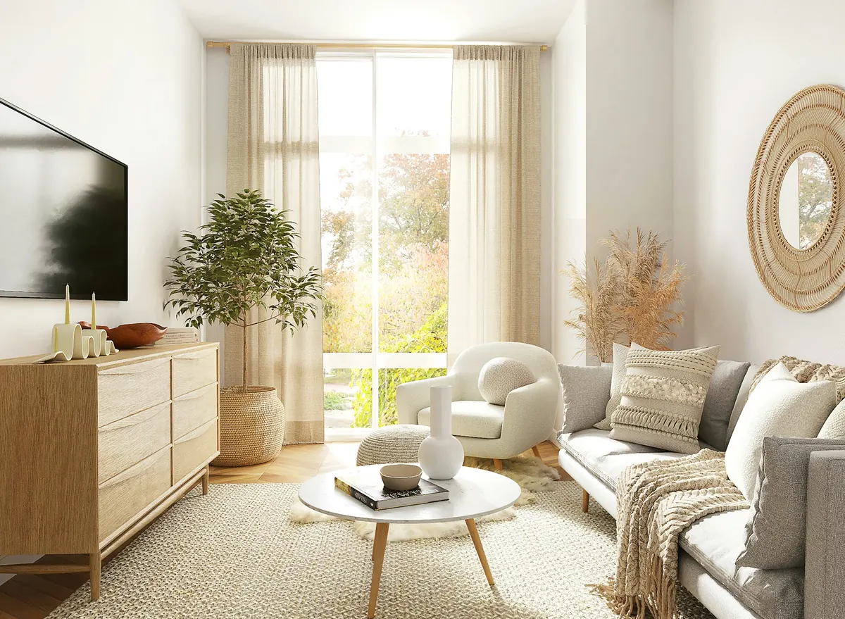 Scandinavian-style living room with gray sofa, wood dresser and sheer curtains